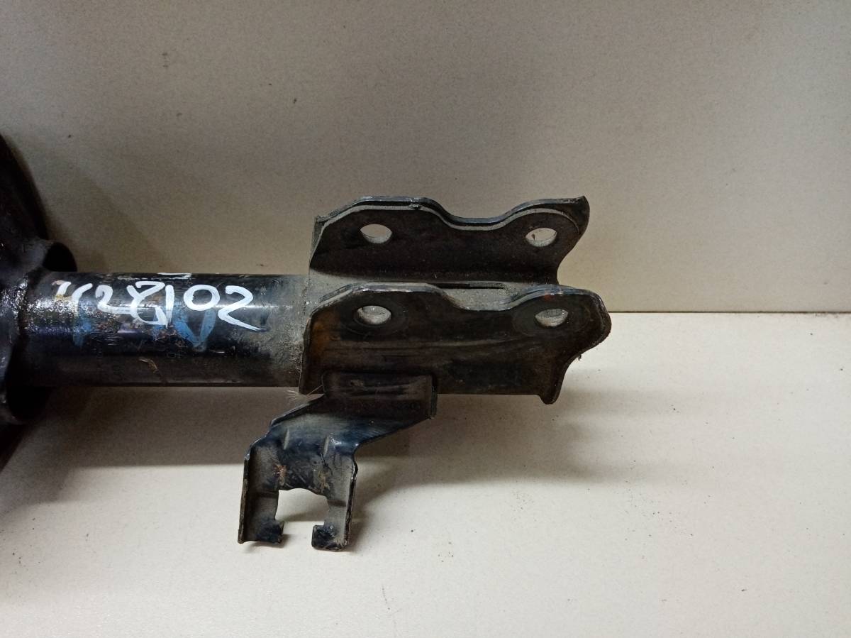 Амортизатор передний левый Nissan Pulsar (N15) 1995-2000