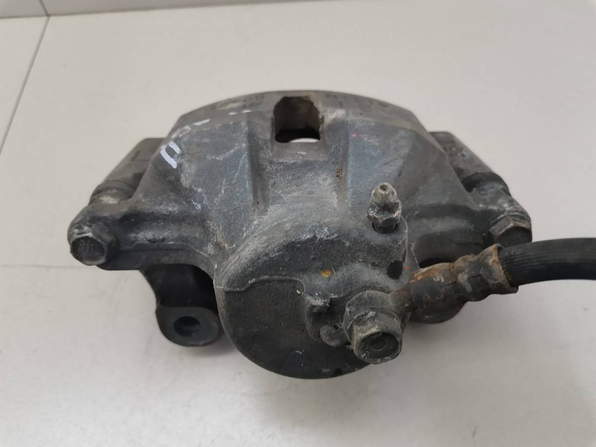 Суппорт передний левый Toyota Crown (S170) 1999-2003