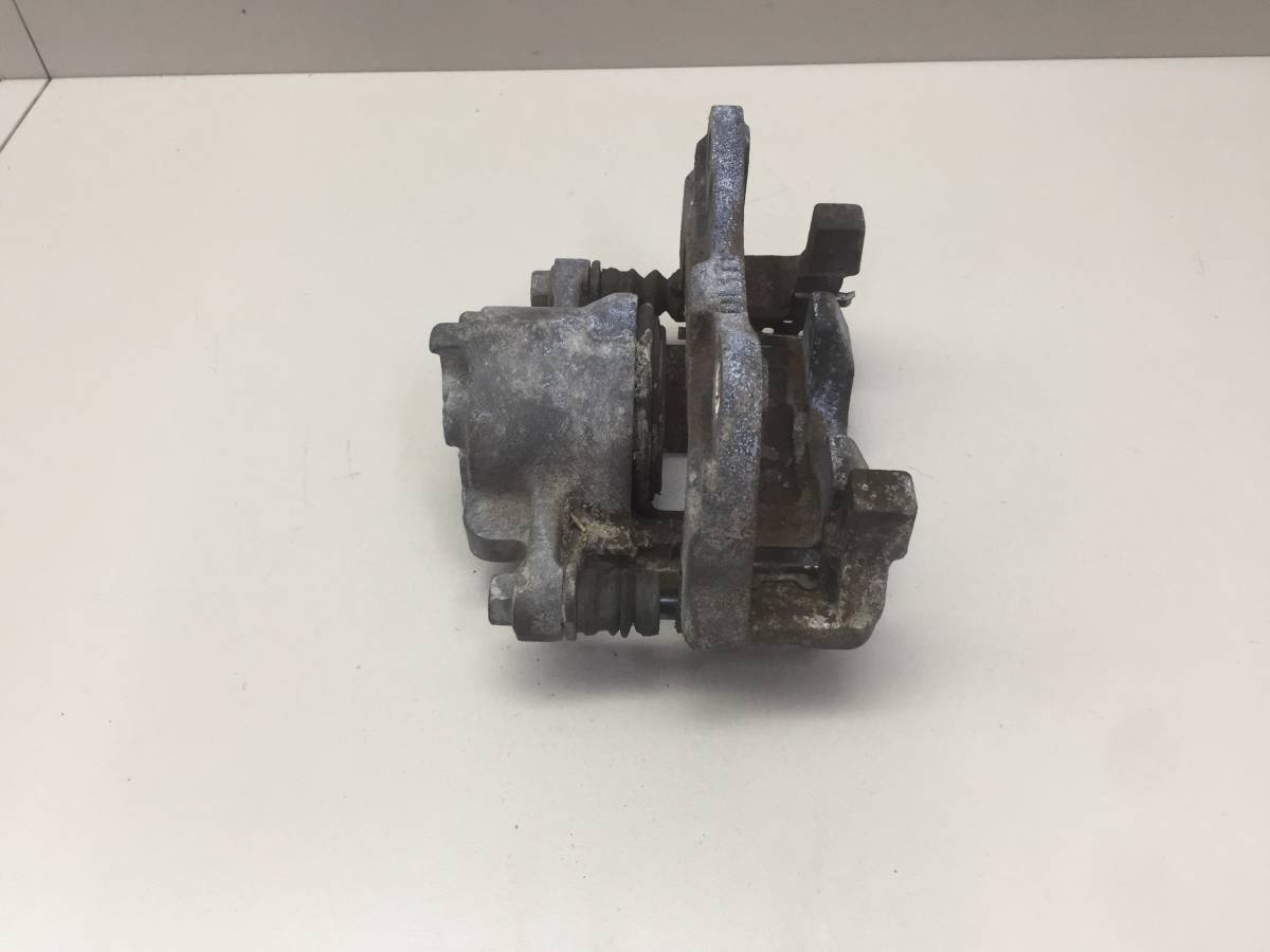 Суппорт передний правый Toyota Passo (XC10) 2004-2010