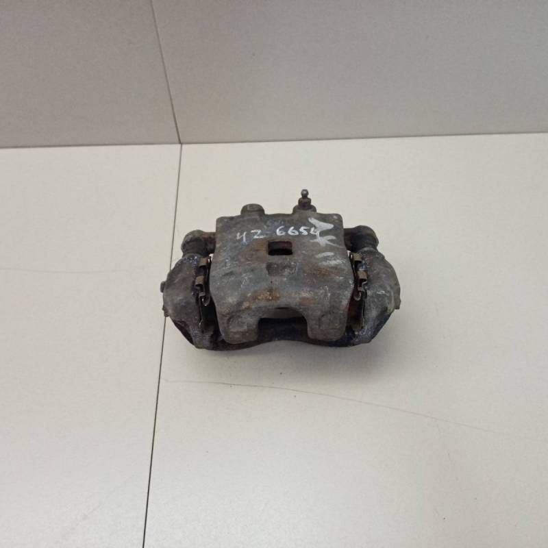 Суппорт передний левый Nissan March (K11) 1992-2002