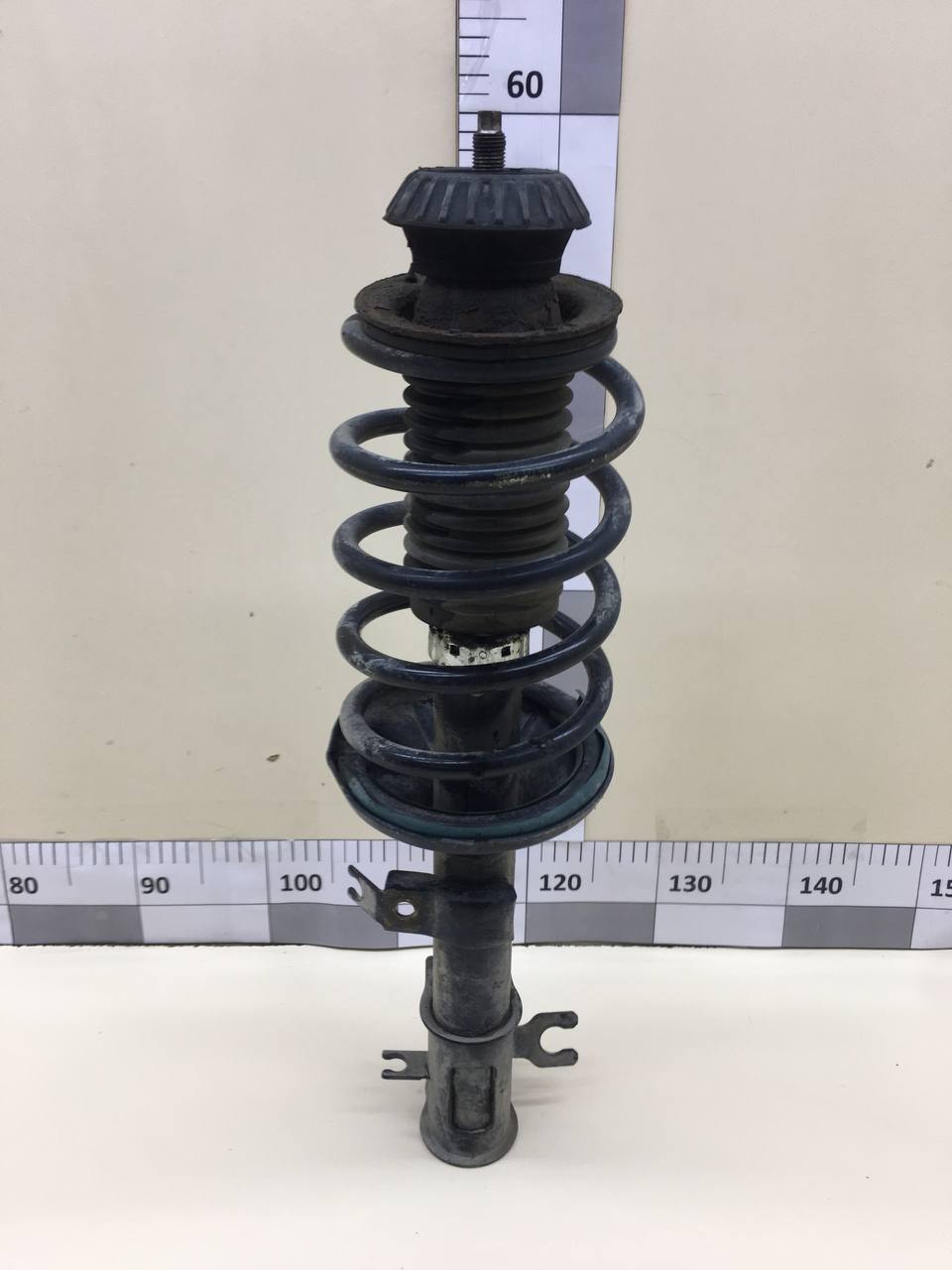 Амортизатор передний левый Chevrolet Aveo T250 2005-2011