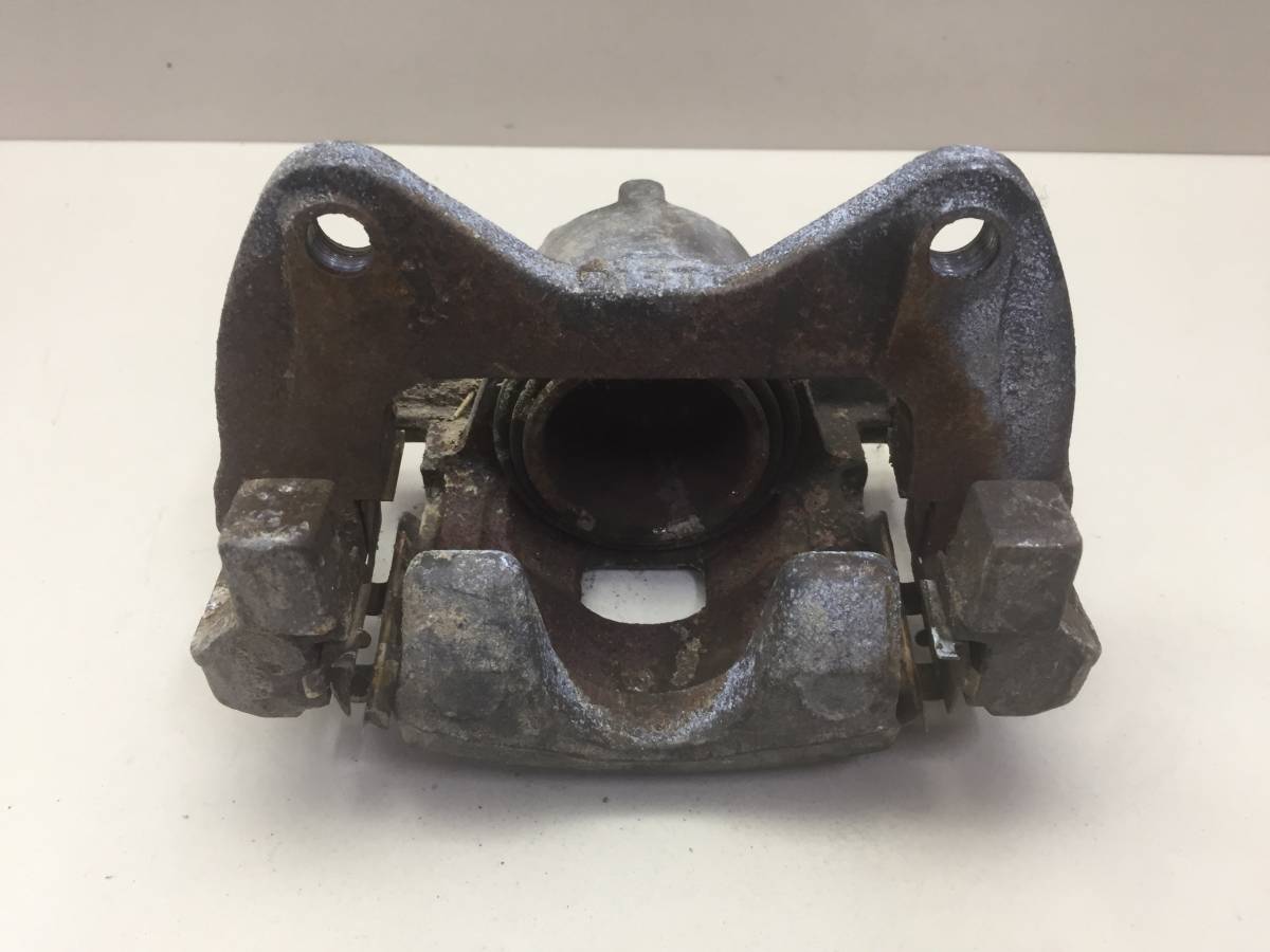 Суппорт передний правый Toyota Passo (XC10) 2004-2010