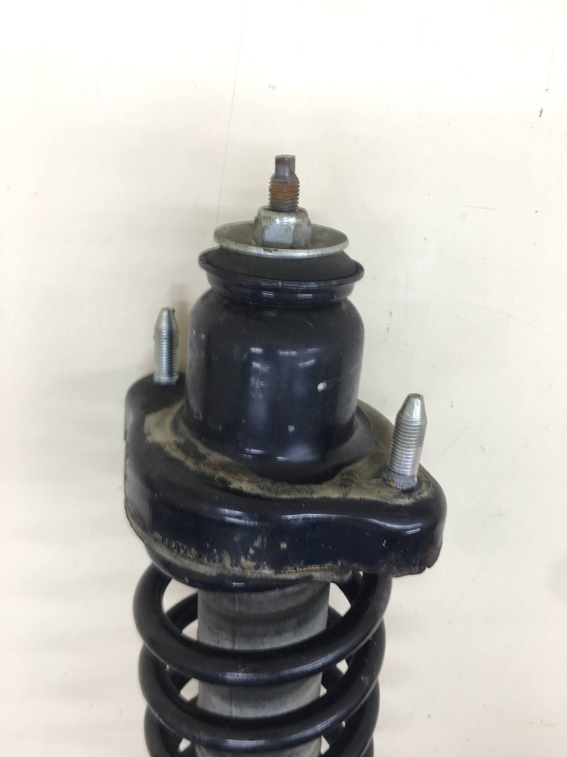 Амортизатор задний Mitsubishi Outlander (GF) 2012>