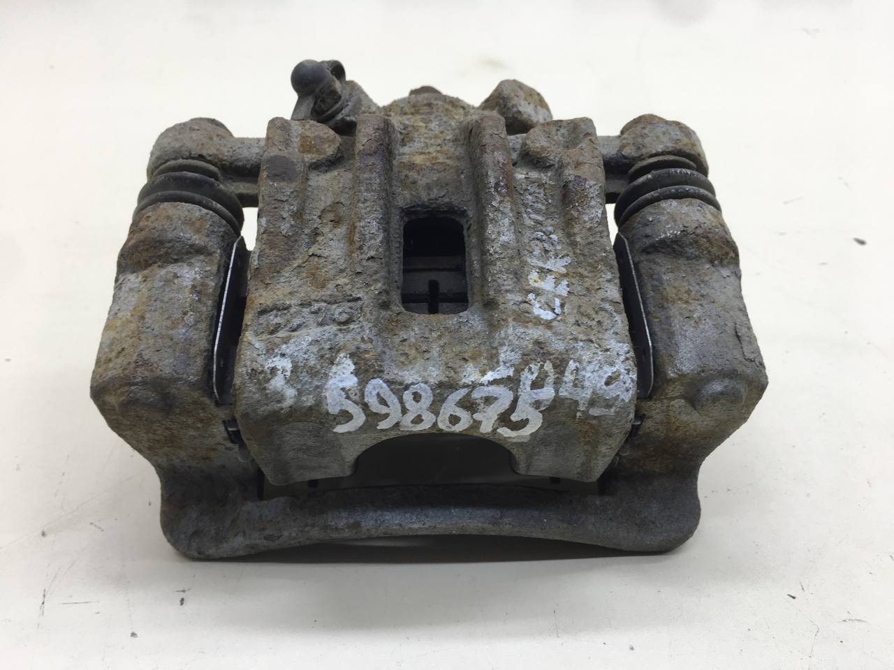 Суппорт задний левый Kia Cerato (TD) 2009-2013