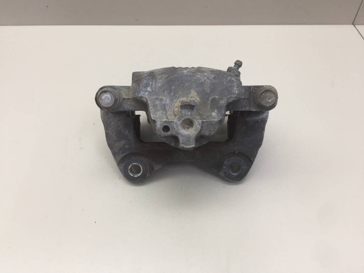 Суппорт передний правый Toyota Passo (XC10) 2004-2010