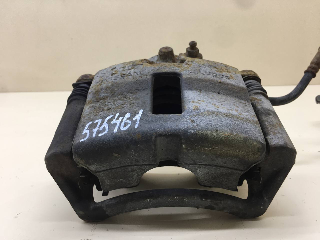 Суппорт передний левый Nissan Primera (P12) 2002-2007