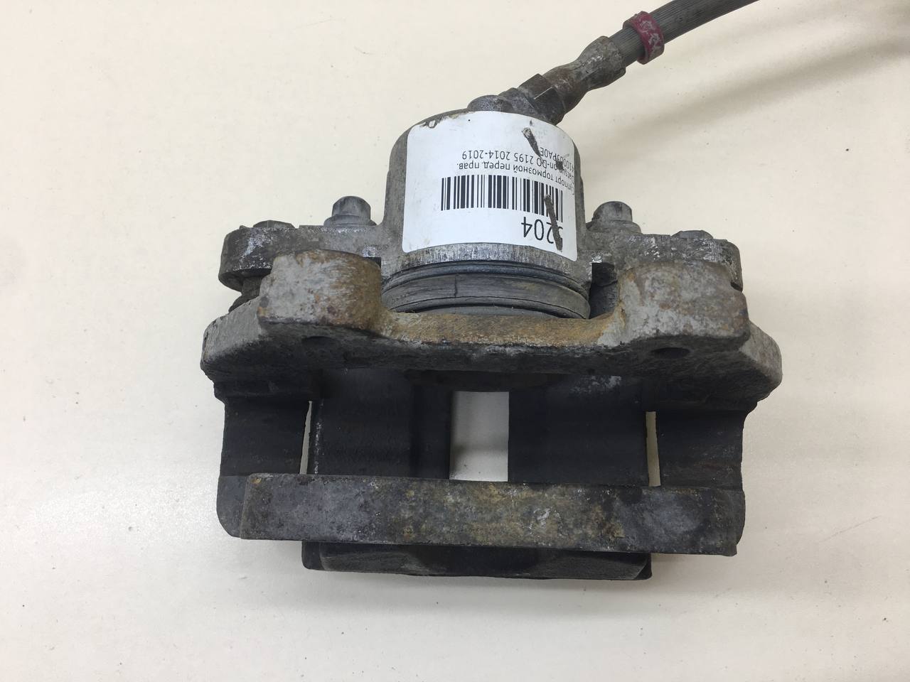 Суппорт передний правый Lada Granta 2011>