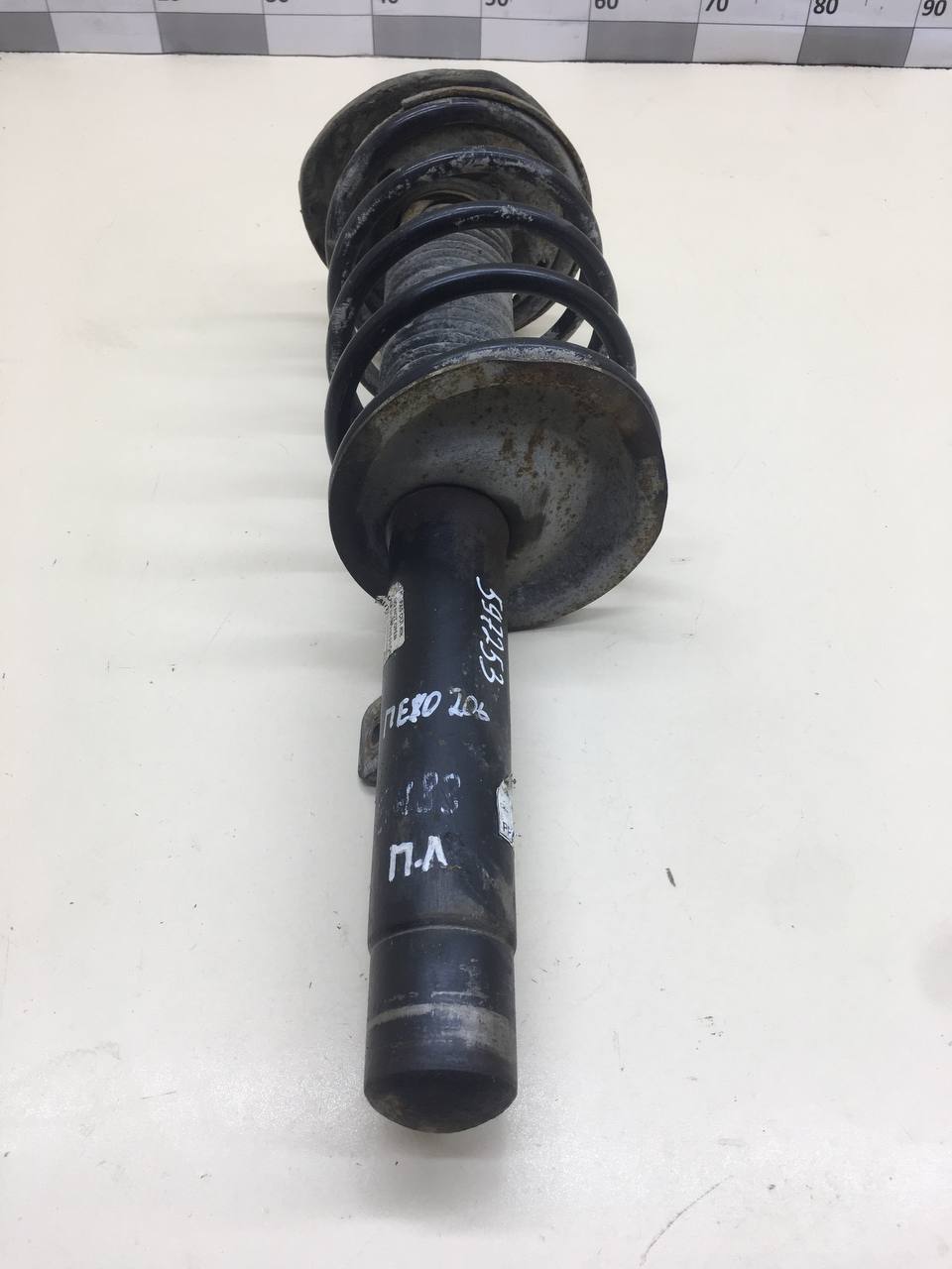 Амортизатор передний левый Peugeot 206 1998-2012