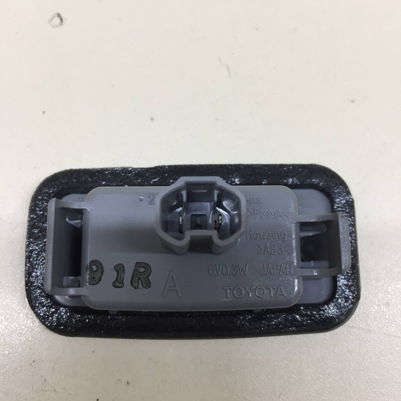 Фонарь подсветки номера Toyota Camry (XV70) 2017>