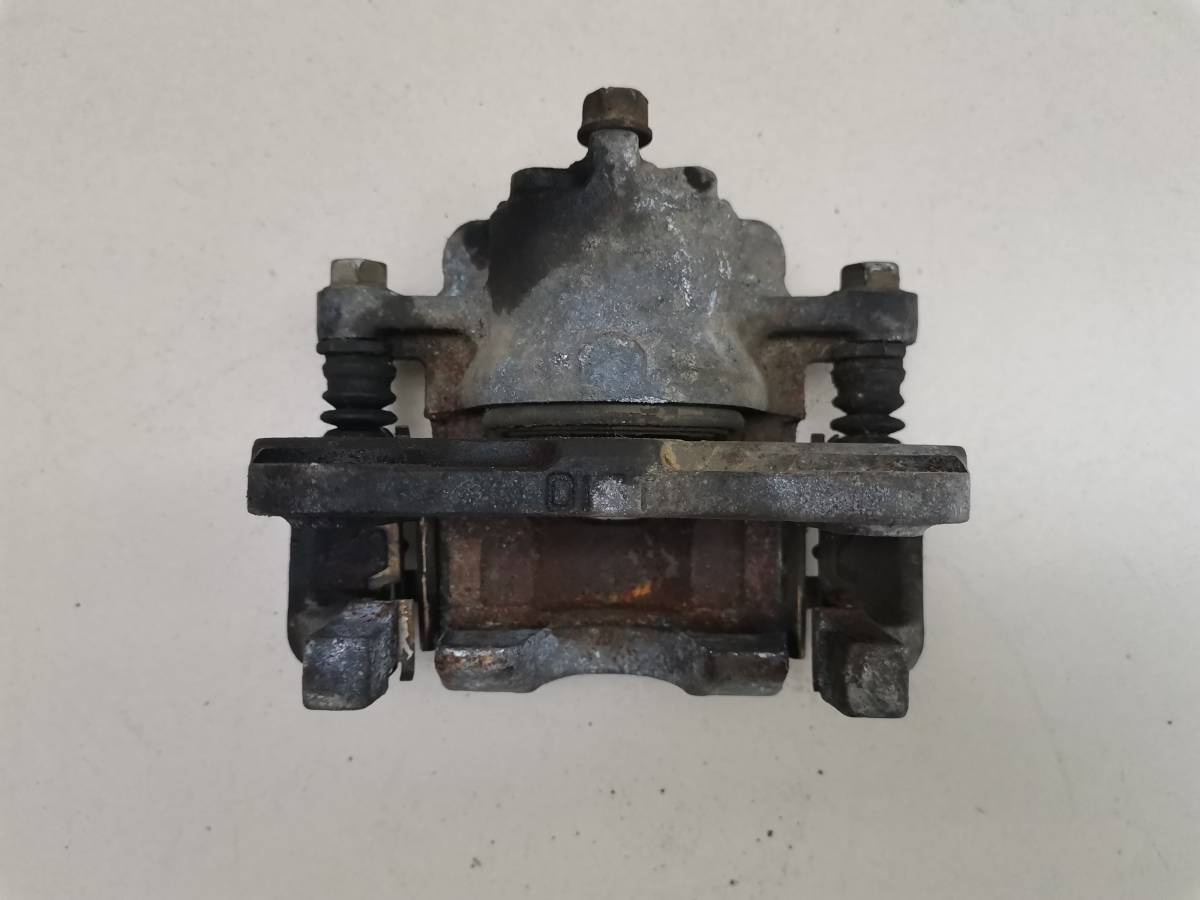 Суппорт передний левый Toyota Passo (XC10) 2004-2010