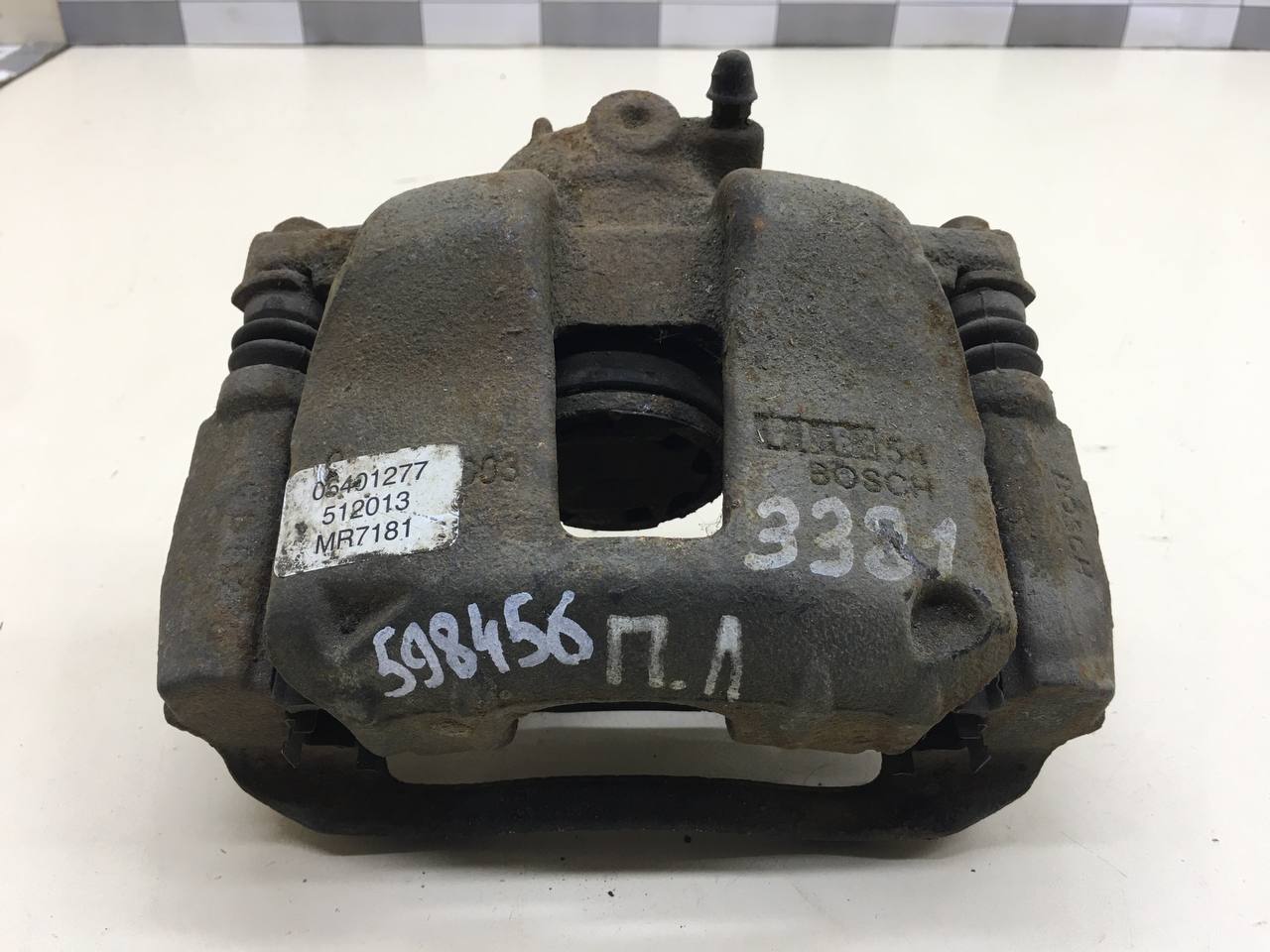 Суппорт передний левый Geely Emgrand EC7 2008>