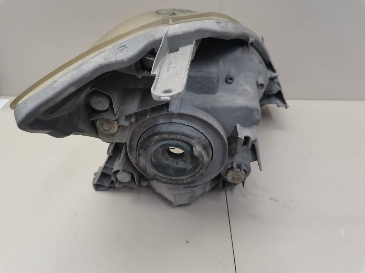 Фара левая Toyota Passo (XC10) 2004-2010