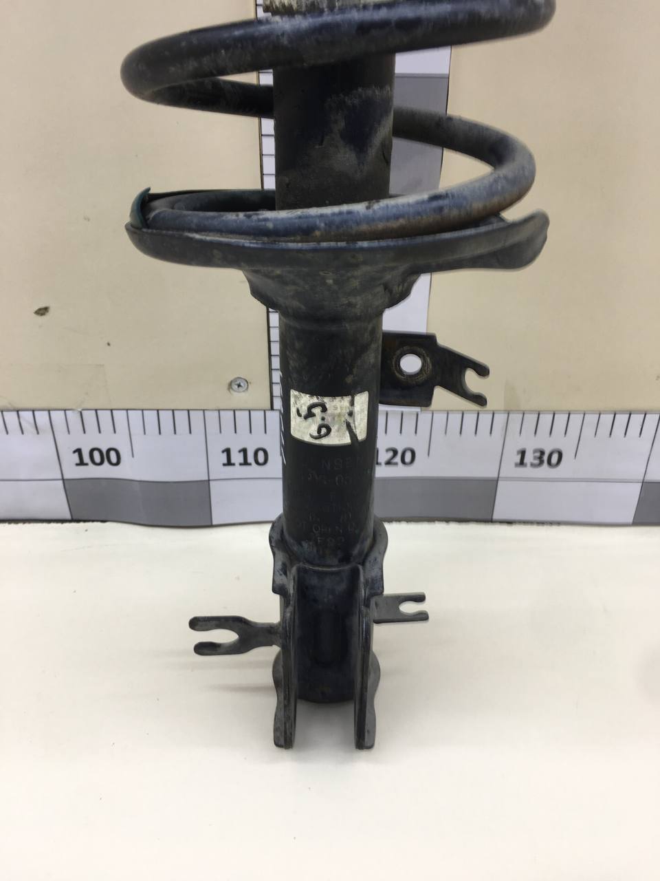 Амортизатор передний левый Chevrolet Aveo T250 2005-2011