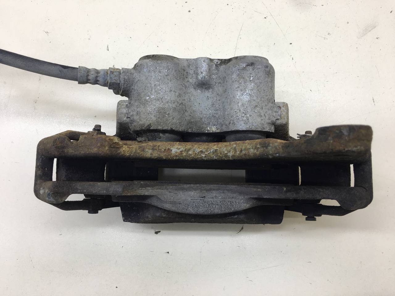 Суппорт передний левый Lada  Niva Travel 2020>