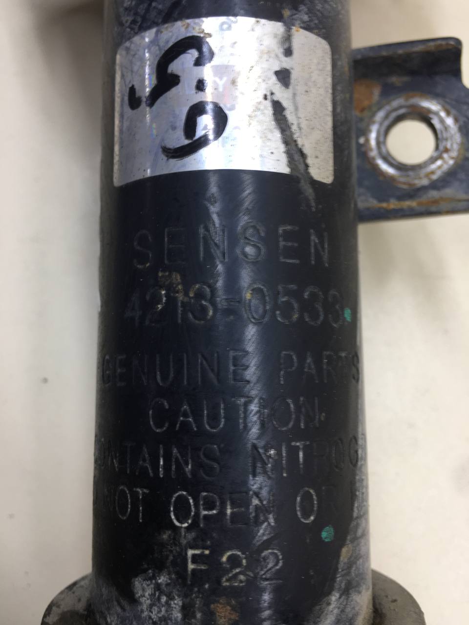 Амортизатор передний левый Chevrolet Aveo T250 2005-2011