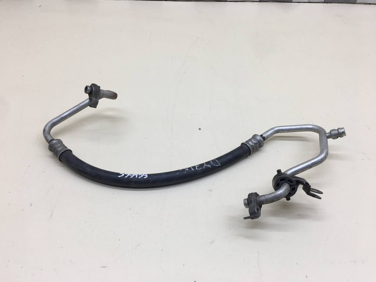 Трубка кондиционера Mazda Demio (DY) 2002-2007