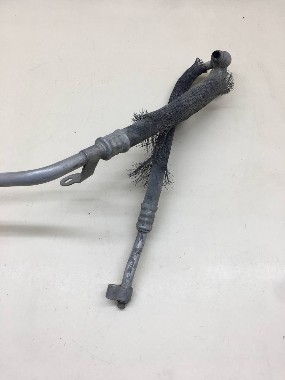 Трубка кондиционера Chevrolet TrailBlazer (GMT360) 2001-2010