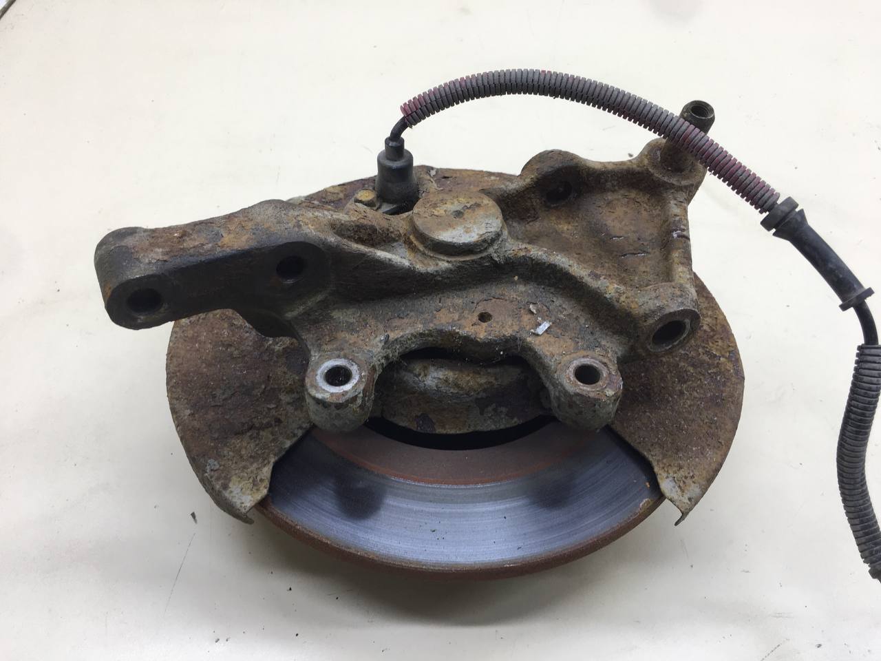 Кулак поворотный задний левый Kia Spectra (SD) 2004-2011