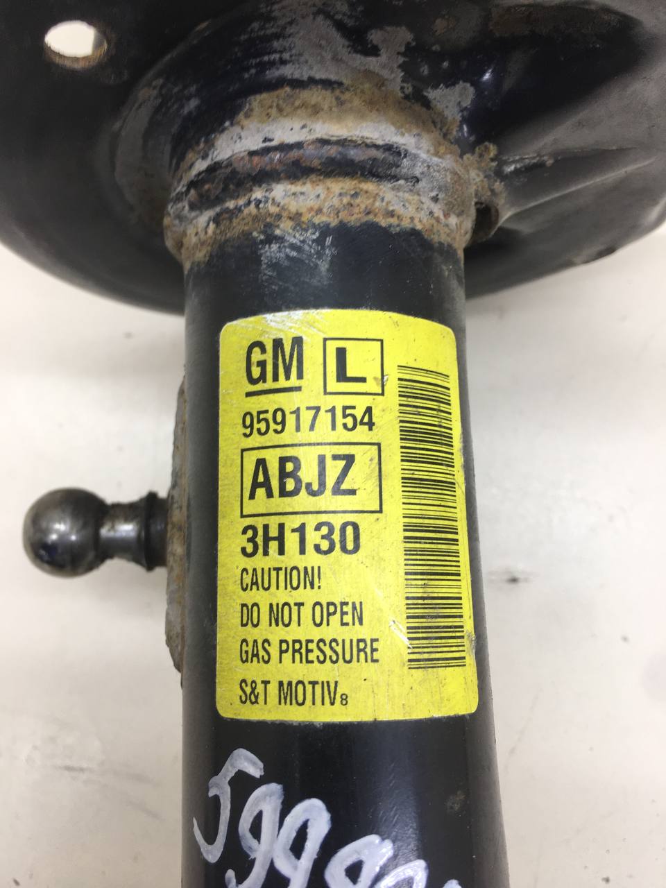 Амортизатор передний левый Chevrolet Aveo T300 2011>