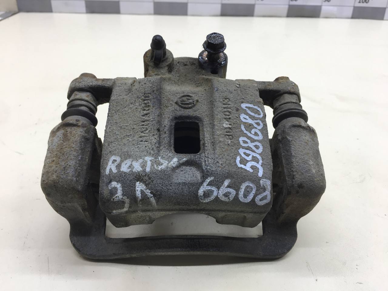 Суппорт задний левый SsangYong Rexton 1 2001-2006