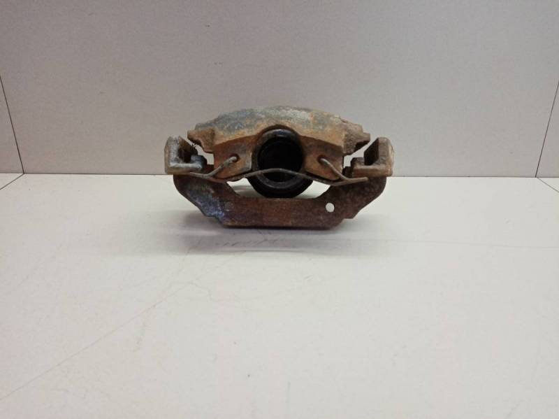 Суппорт передний правый Mazda Demio (DY) 2002-2007