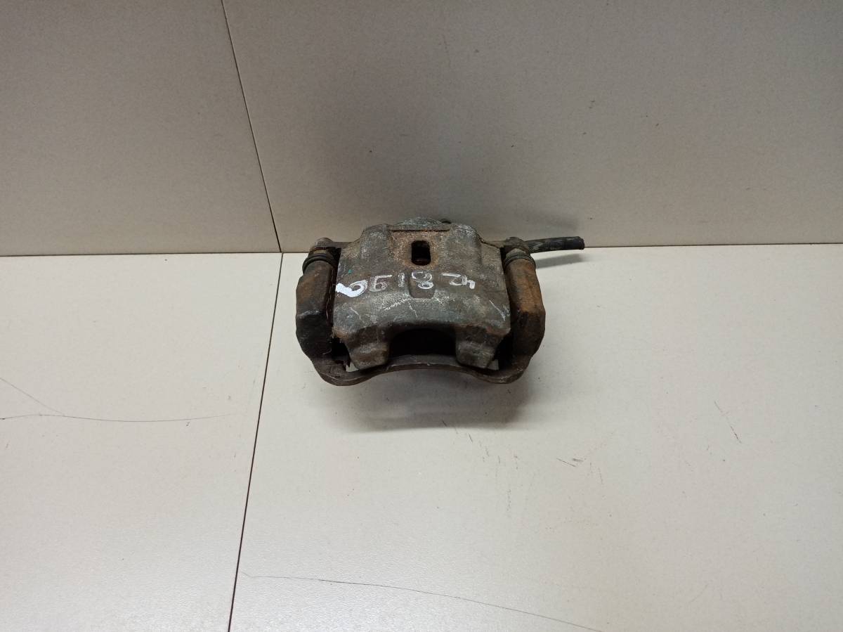 Суппорт передний левый Toyota Vitz (P10) 1999-2005