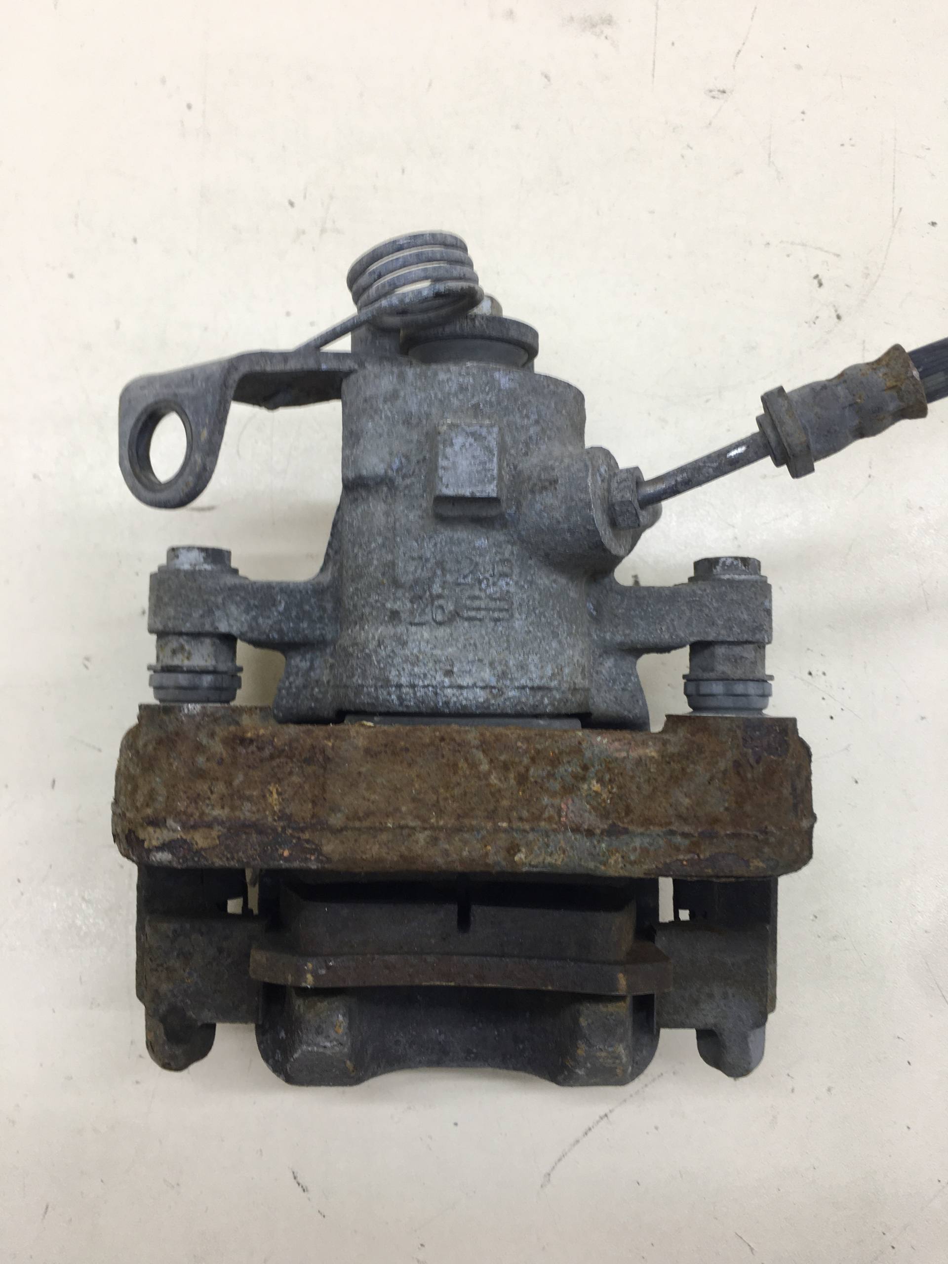 Суппорт задний левый Peugeot 208 2012>