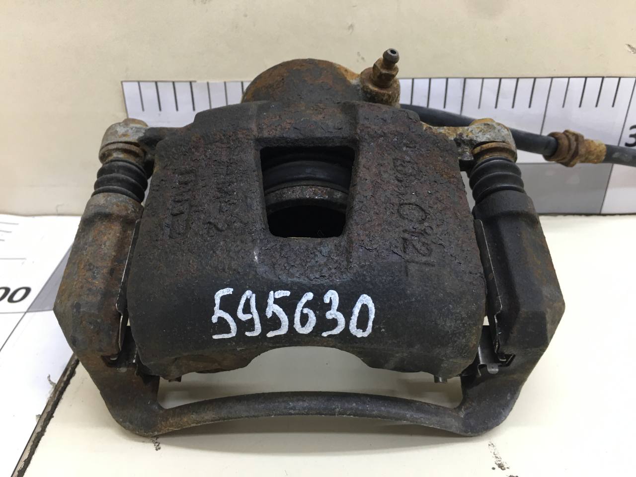 Суппорт передний левый Chevrolet Lacetti (J200) 2003-2013