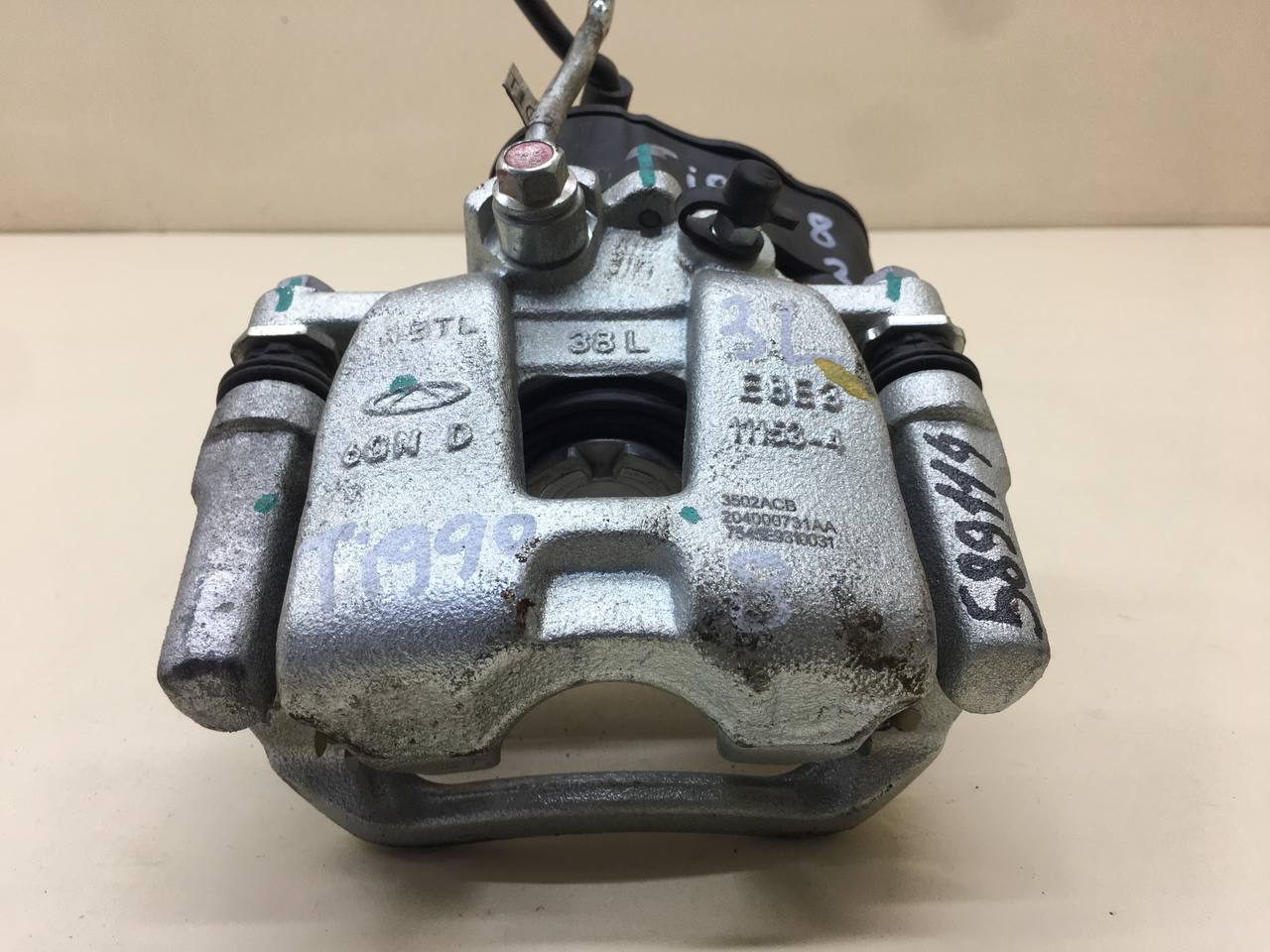 Суппорт задний левый Chery Tiggo 8 Pro 2021-2024