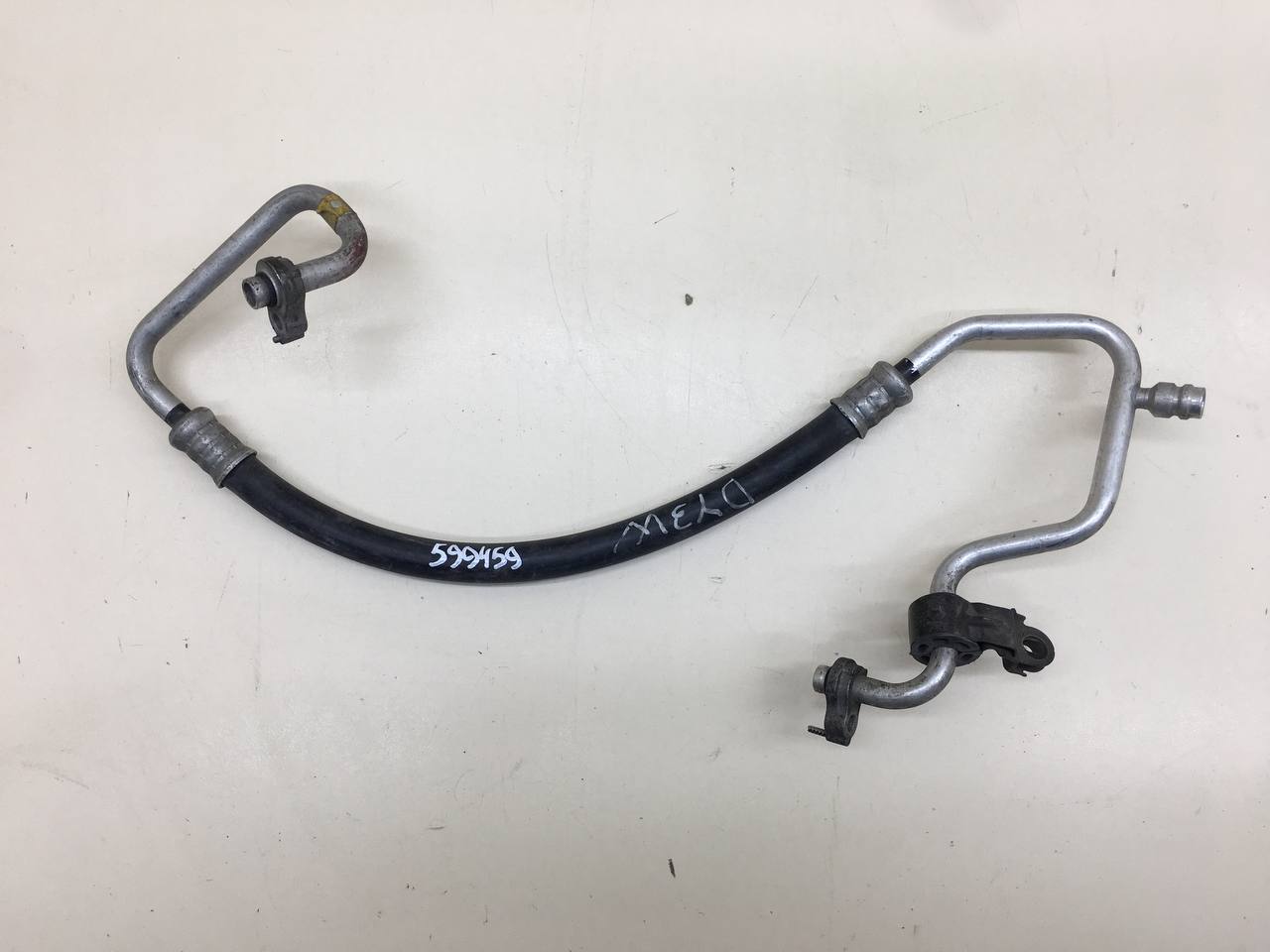 Трубка кондиционера Mazda Demio (DY) 2002-2007