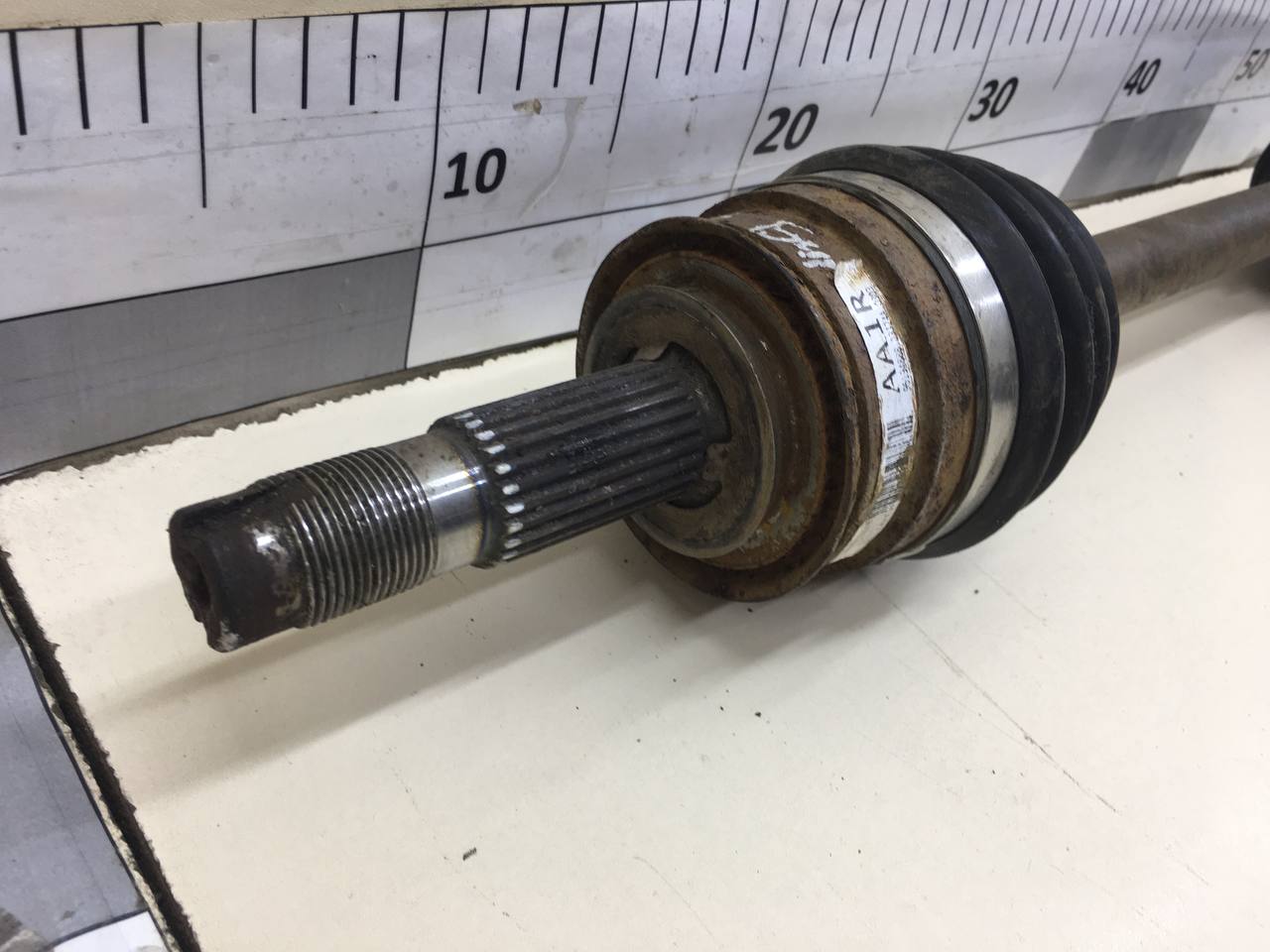 Полуось передняя левая Chevrolet Aveo T300 2011>