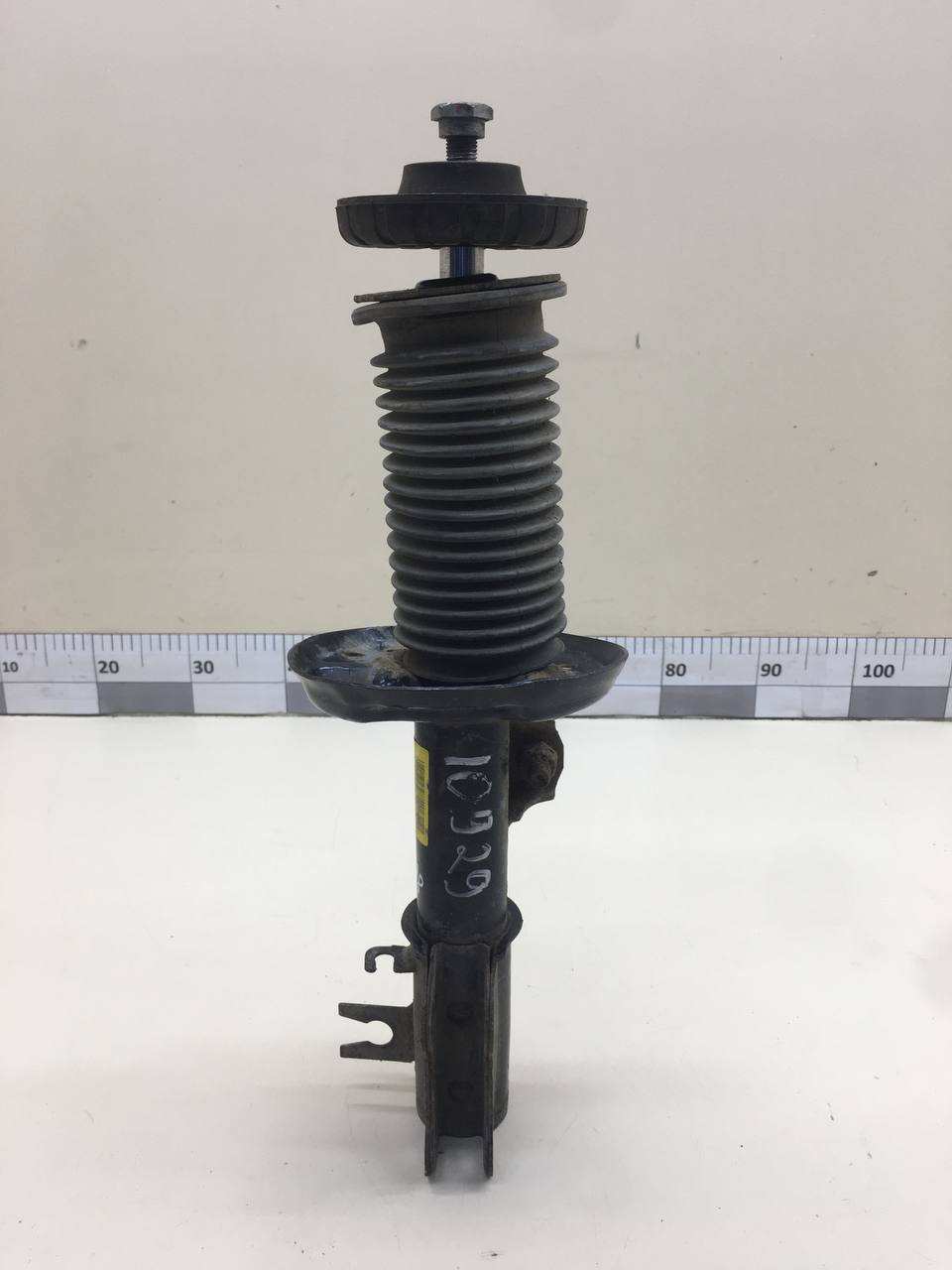 Амортизатор передний левый Chevrolet Aveo T300 2011>