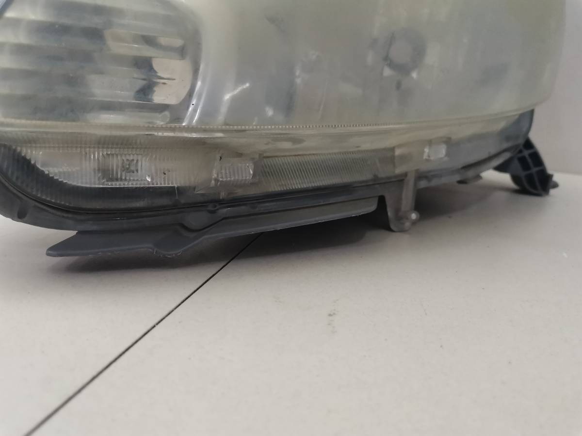 Фара левая Toyota Passo (XC10) 2004-2010