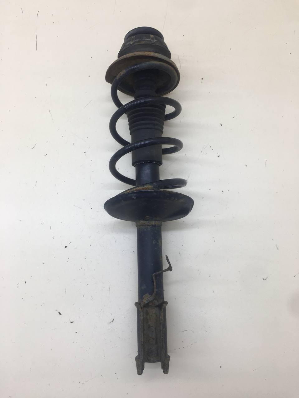 Амортизатор передний Nissan Almera 3 (G11, G15) 2012>