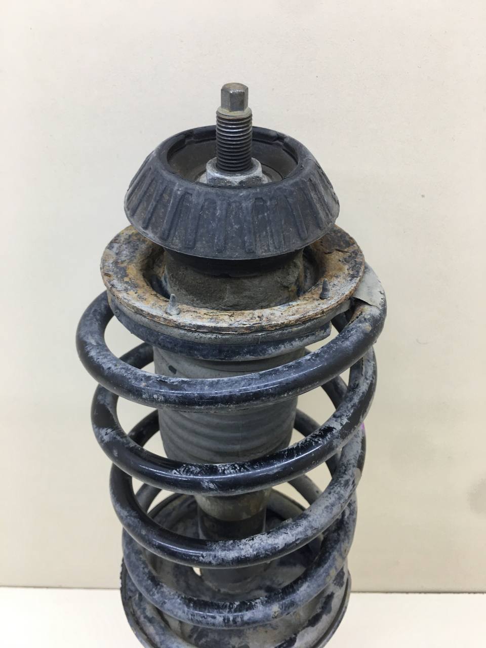 Амортизатор передний левый Chevrolet Aveo T250 2005-2011