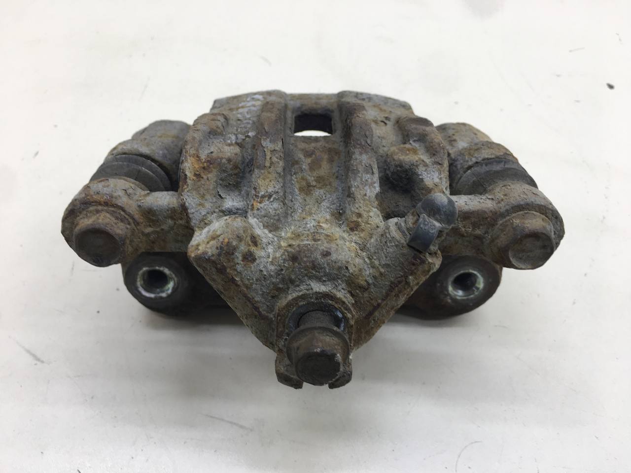 Суппорт задний левый Kia Cerato (TD) 2009-2013