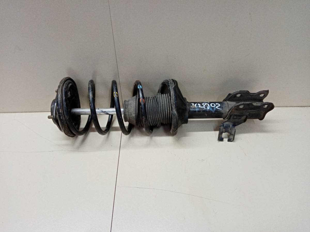 Амортизатор передний левый Nissan Pulsar (N15) 1995-2000