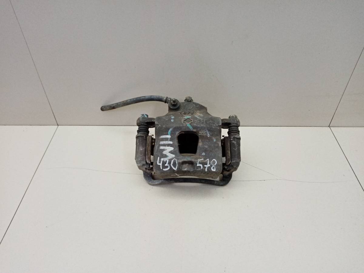 Суппорт передний правый Nissan Avenir (W10) 1990-1999