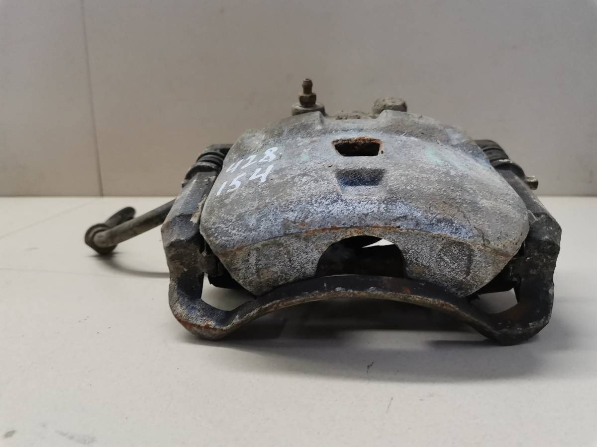 Суппорт передний правый Nissan Pulsar (N15) 1995-2000