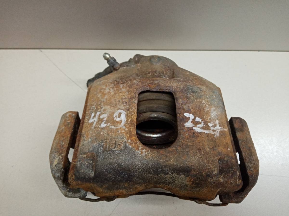 Суппорт передний правый Mazda Demio (DY) 2002-2007