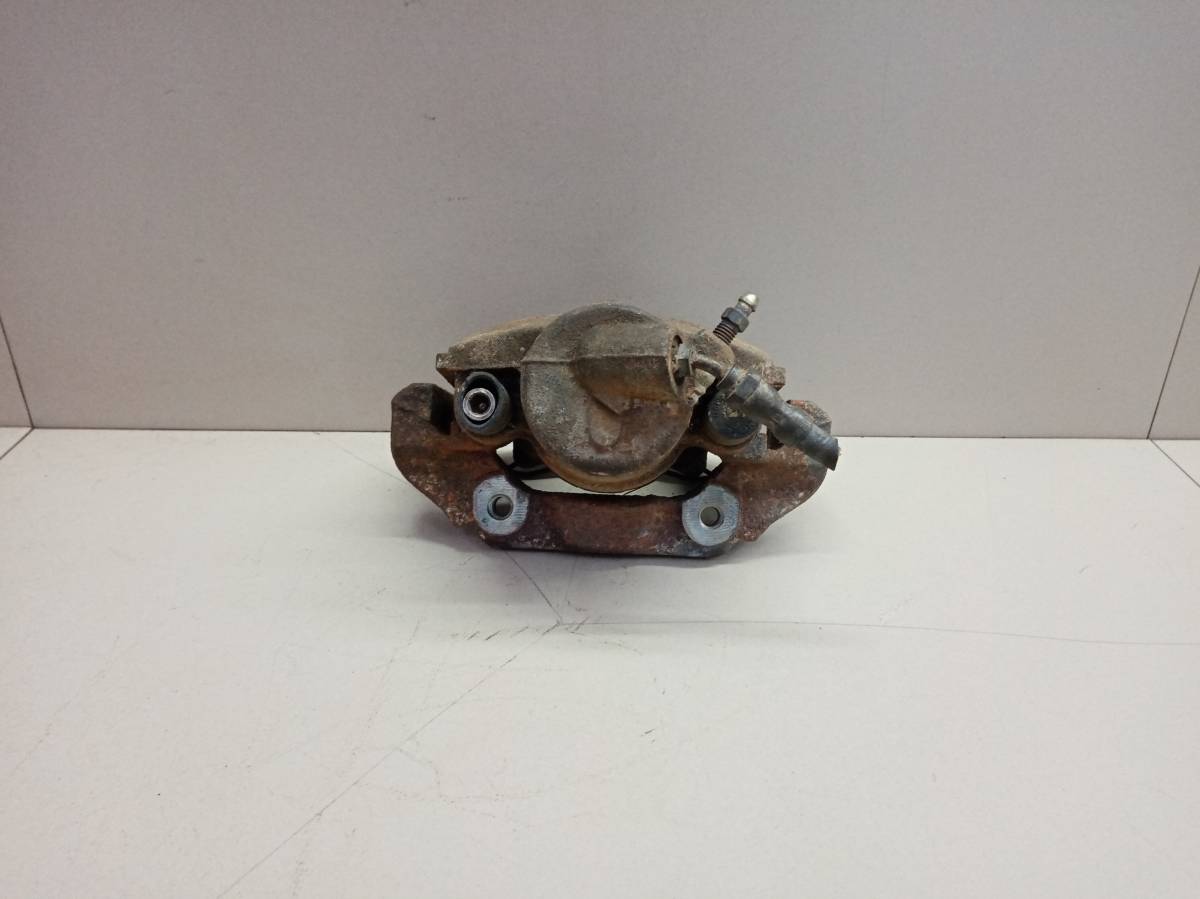 Суппорт передний правый Mazda Demio (DY) 2002-2007