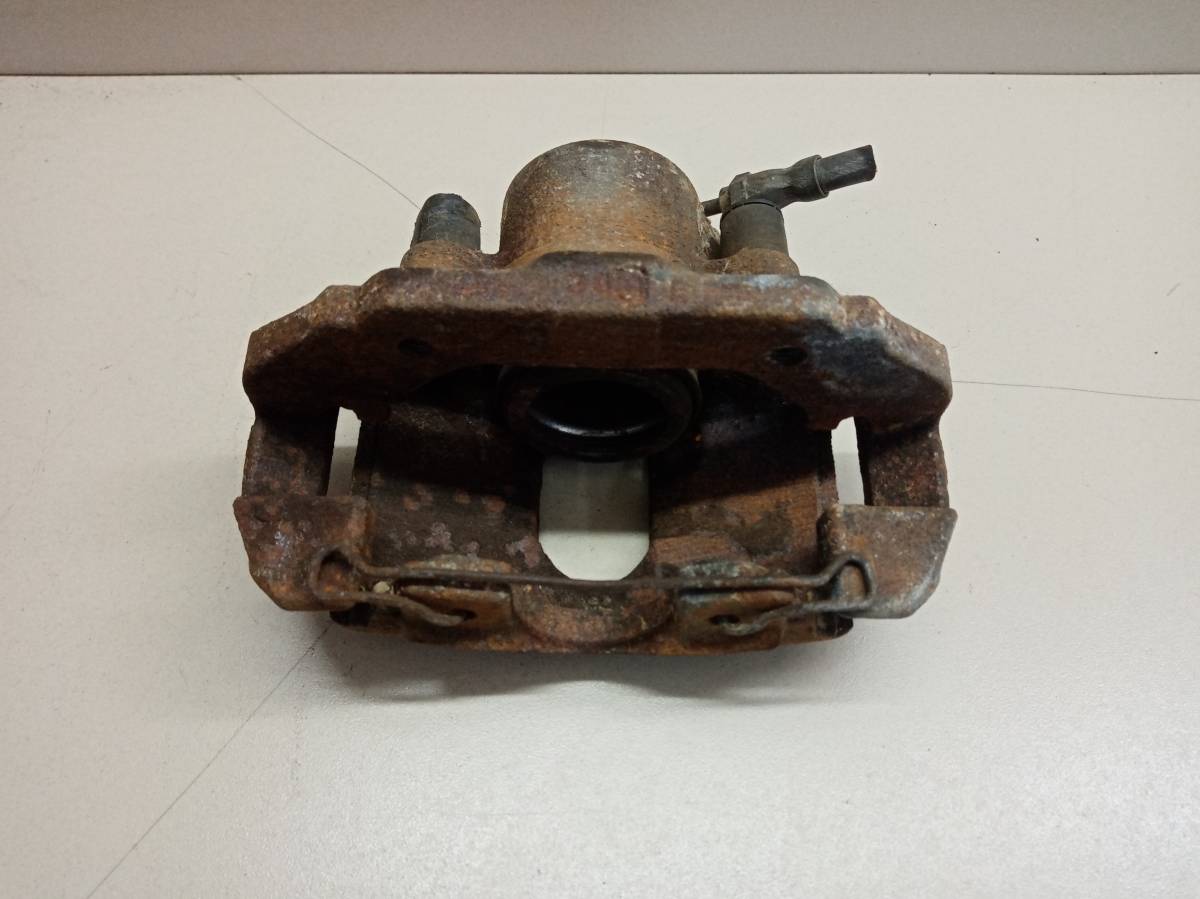 Суппорт передний правый Mazda Demio (DY) 2002-2007