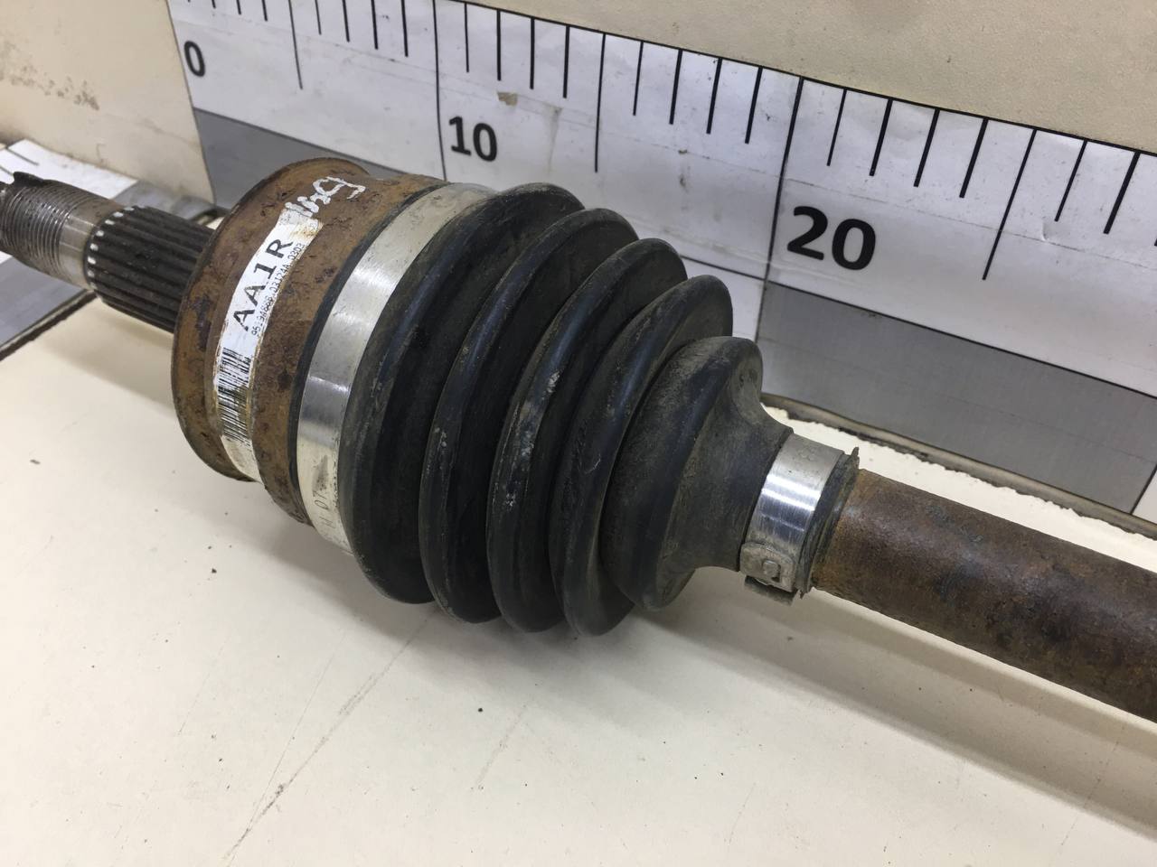 Полуось передняя левая Chevrolet Aveo T300 2011>