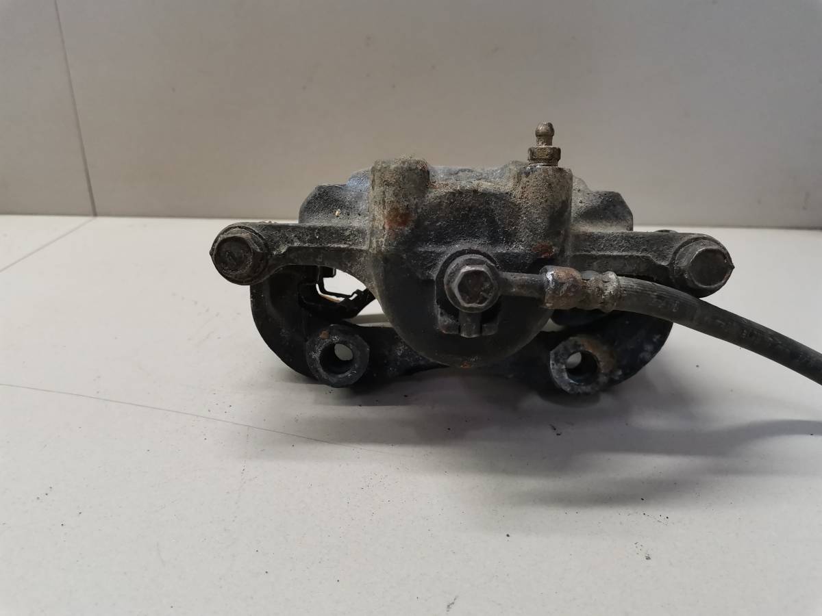 Суппорт передний правый Nissan Pulsar (N15) 1995-2000